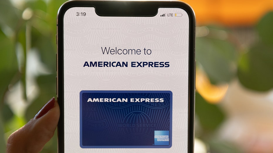 An American Express credit card on a phone