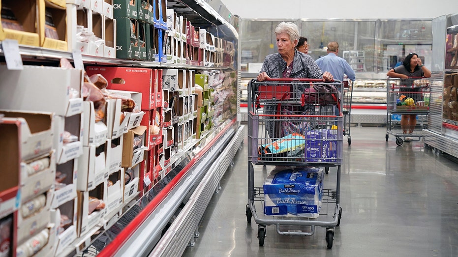 Customers shop at a grocery store in California